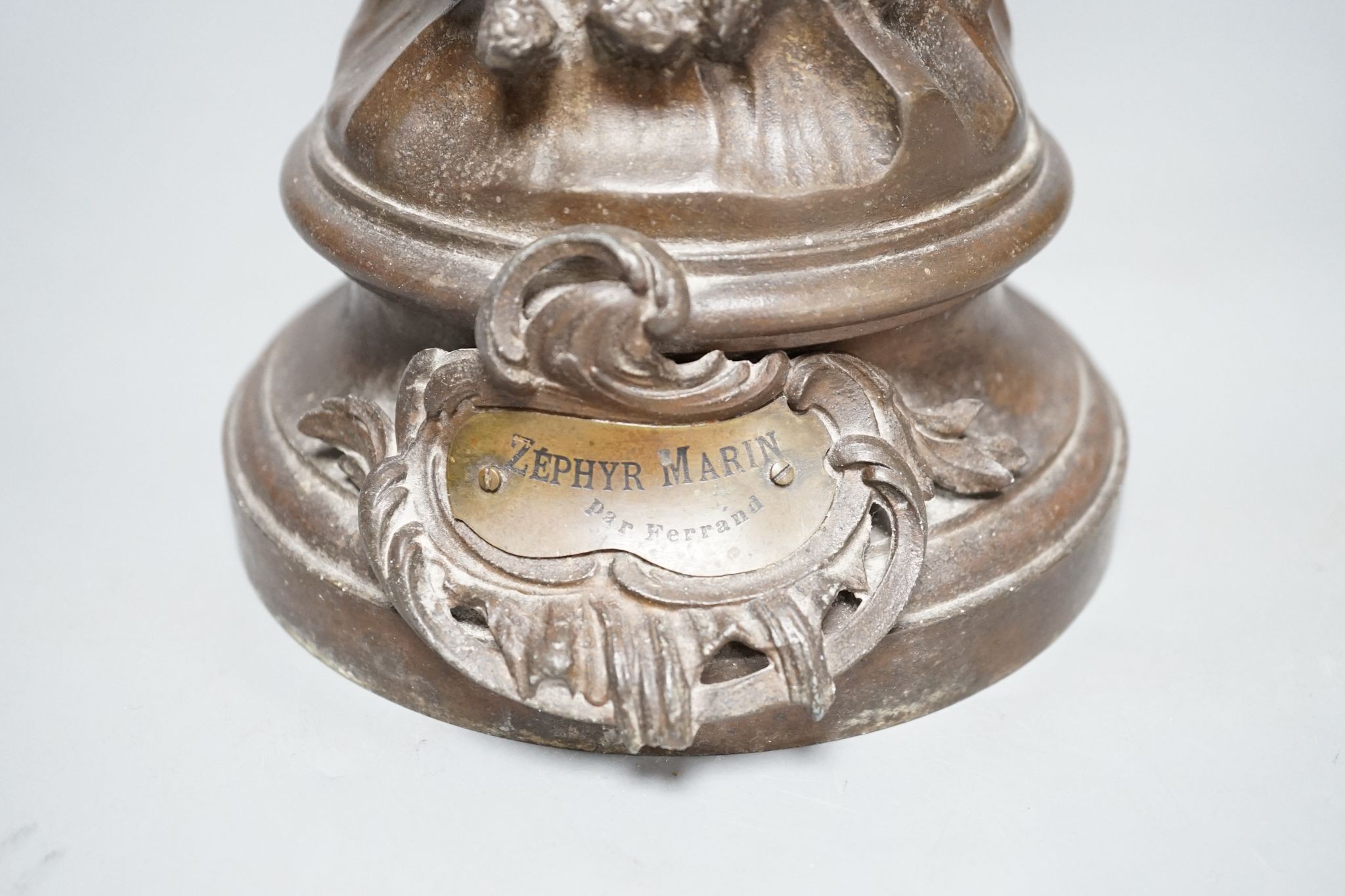 After Ferrand, a spelter figure of a gentleman upon a dolphin, plaque to base reading ‘Zephyr Marin Par Ferrand’, 50cm